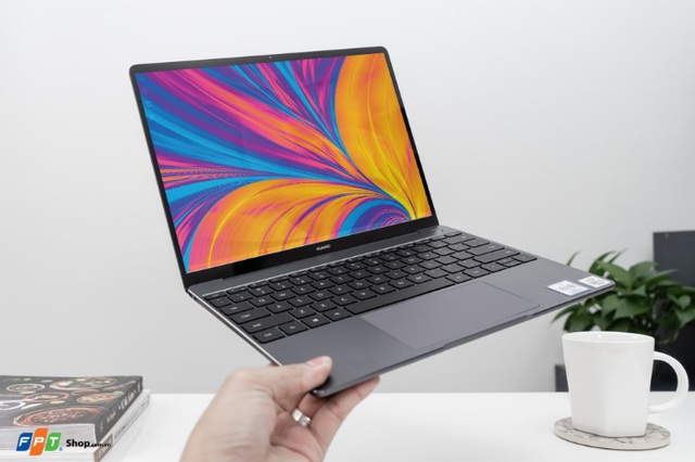 Nhận ngay loa bluetooth gần 7 triệu khi đặt trước Huawei MateBook 13 tại FPT Shop - Ảnh 1.